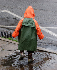 Image showing Boy play in rain.