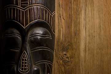 Image showing African mask over wooden background