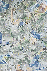 Image showing polish zloty banknotes background