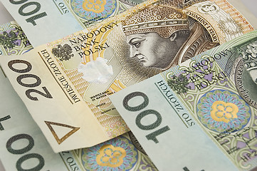 Image showing polish zloty banknotes background