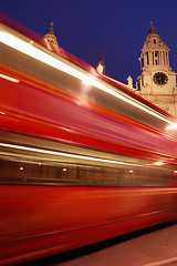 Image showing Blurred red London bus