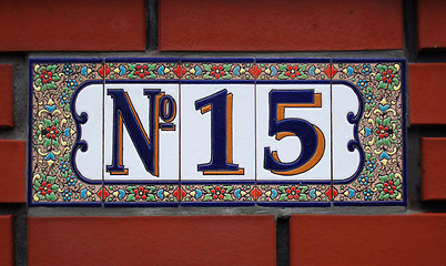 Image showing House number tile plaque with floral ornament