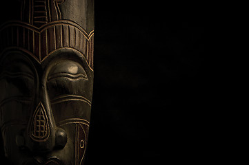 Image showing African mask over black background