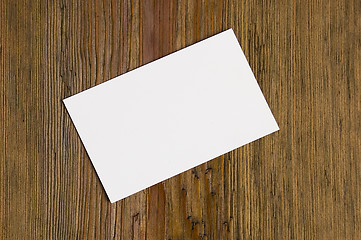 Image showing Blank card over wood