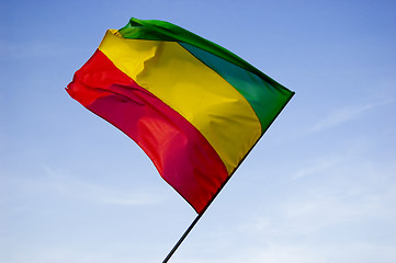 Image showing reggae flag over blue sky