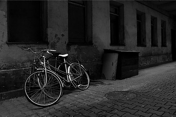 Image showing Vintage bikes over old wall