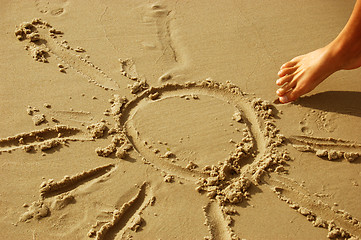 Image showing Sun drawing on sand