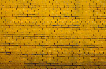 Image showing Background with old yellow painted brick wall