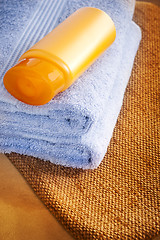 Image showing towel and shampoo