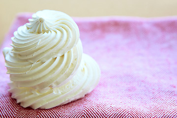 Image showing Tasty white meringue on a napkin.