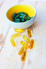 Image showing fish oil vitamins  and herbal pills