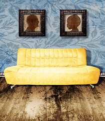 Image showing family portrait and couch on wallpaper