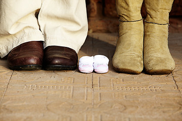 Image showing pregnant couple boots