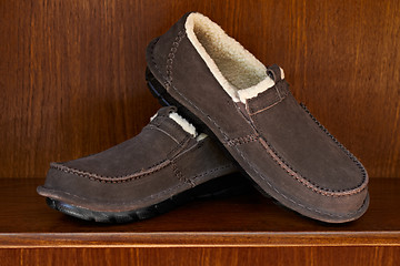 Image showing brown shoes on shelf