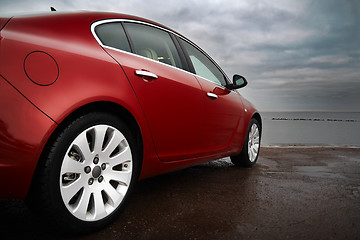 Image showing Luxury cherry red car