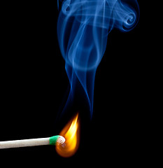 Image showing Green headed match starts to smoulder