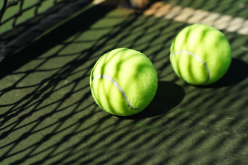 Image showing Tennis balls in court