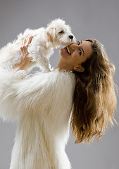 Image showing sexy fit woman with pet