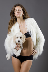 Image showing sexy fit woman with pet