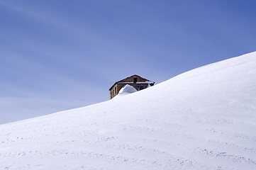 Image showing The old brick house in middle of ski slope