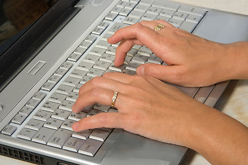 Image showing hands over keyboard