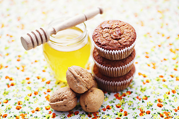 Image showing muffins with walnuts and honey