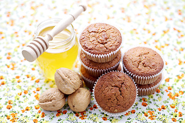 Image showing muffins with walnuts and honey