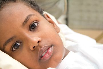 Image showing Boy resting in his bed