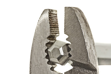 Image showing Slip joint pliers griping on