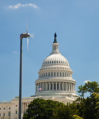 Image showing Capitol Building framed by wind turbine