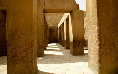 Image showing Ancient stone pillars underneath Spinx