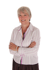 Image showing Smiling Senior Businesswoman with Arms Folded