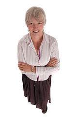 Image showing Smiling Senior Business Woman with Arms Folded