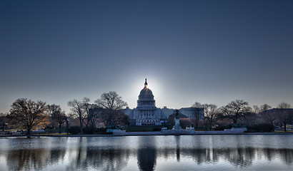 Image showing Sunrise behind the dome of the Capitol in DC