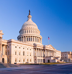 Image showing Rising sun illuminates the front of the Capitol building in DC