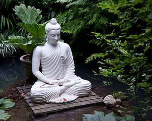 Image showing Buddha statue in pond