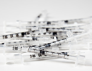 Image showing Pile of used syringes