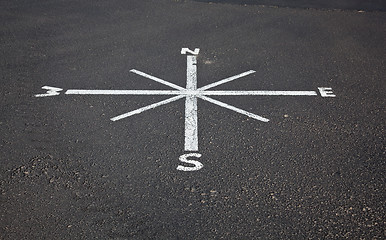 Image showing Painted compass on road surface