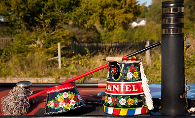 Image showing Hand painted traditional decorated watering cans