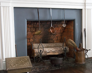 Image showing Old fireplace with logs