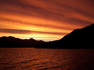 Image showing Sunset over water near Queenstown