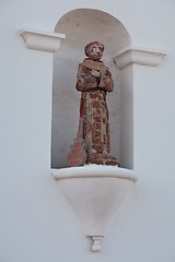 Image showing Humorous statue of saint with guitar