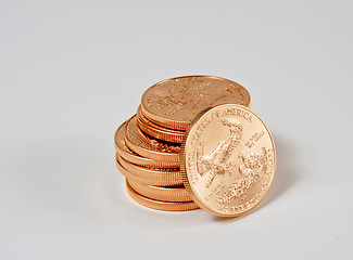 Image showing Stack of 1 ounce gold coins