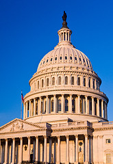 Image showing Rising sun illuminates the front of the Capitol building in DC