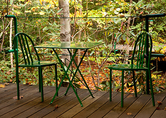 Image showing Green table and chairs