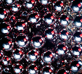 Image showing Ball bearings illuminated by color lights