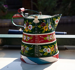Image showing Hand painted traditional decorated watering cans