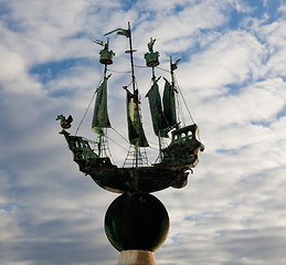 Image showing Model of sailing ship against cloudy sky