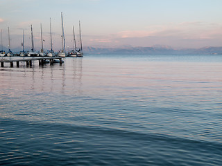 Image showing Yachts at dock in sunset