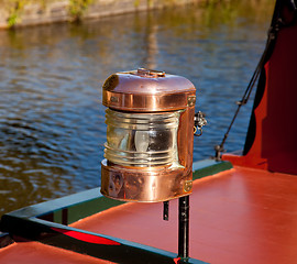 Image showing Ornate brass driving lamp on canal barge